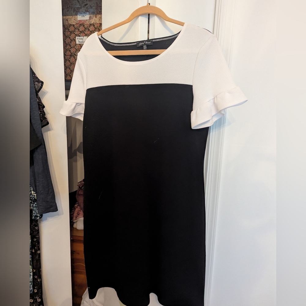 Slinky Brand Black and White Dress With Rufle Sleeves.
